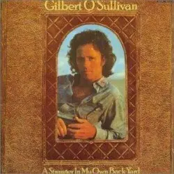 A Stranger in My Own Back Yard by Gilbert O’Sullivan