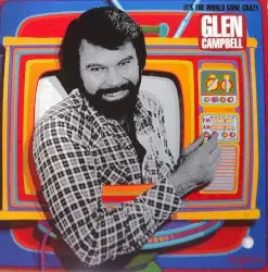 It’s the World Gone Crazy by Glen Campbell